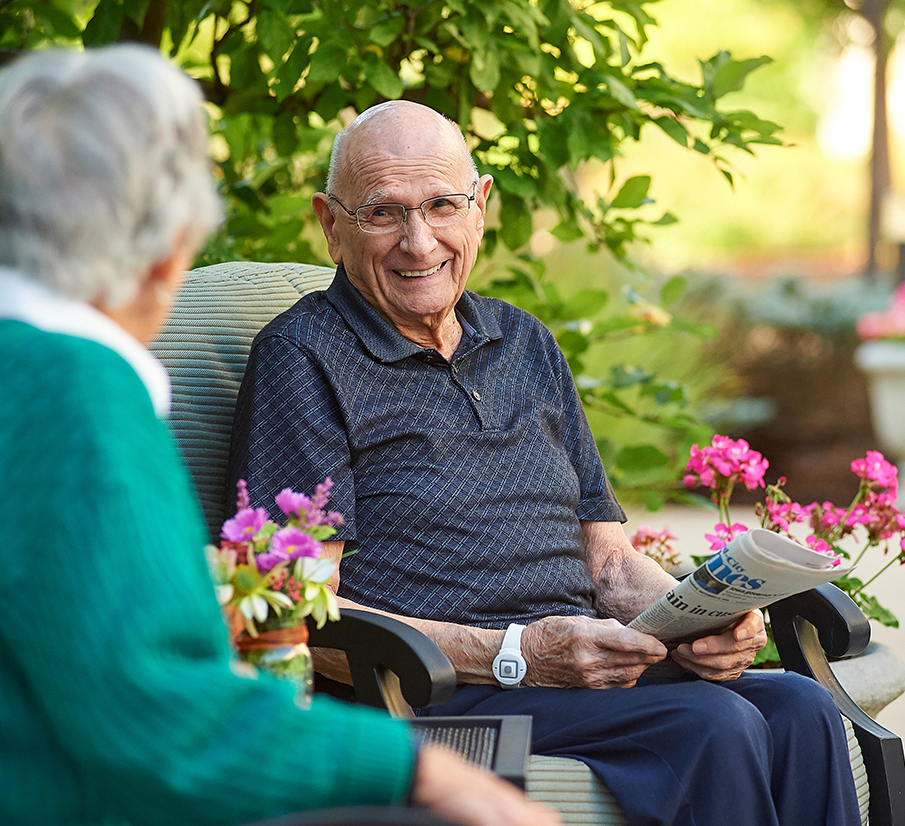 Respite residents smiling at each other