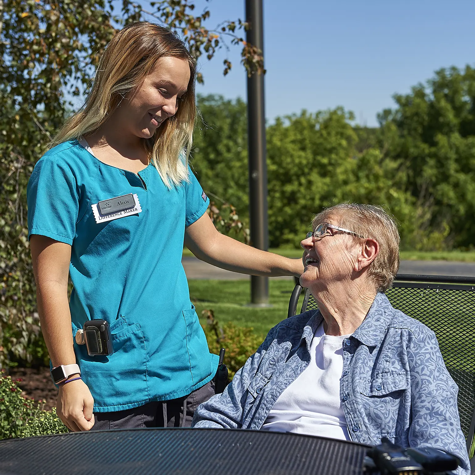 Assisted living residents sitting at a table